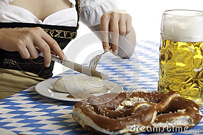 Bavarian Girl having a Oktoberfest meal Stock Photo