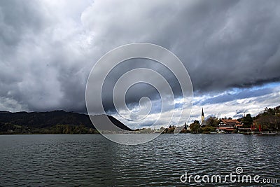 Bavarian lake Schliersee with dramatic clouds Stock Photo