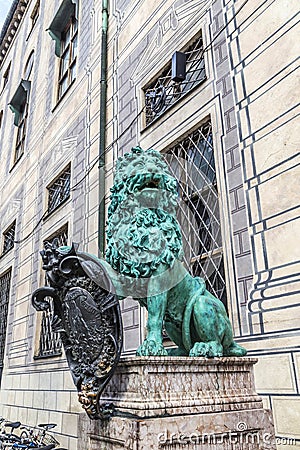 bavarian lion statue in front of residence palace at odeonsplatz Stock Photo