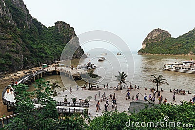 Bay near Thien Cung Cave with many boats and tourists in summer at Ha Long Bay in Quang Ninh, Vietnam Editorial Stock Photo