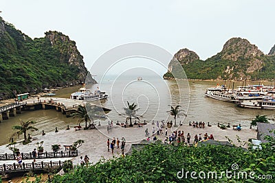 Bay near Thien Cung Cave with many boats and tourists in summer at Ha Long Bay in Quang Ninh, Vietnam Editorial Stock Photo