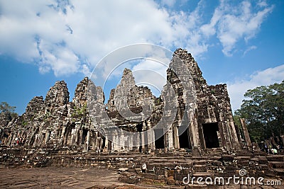Bayon temple with the four sided face stone sculptures Angkor Thom Cambodia 28 December 2013 Editorial Stock Photo
