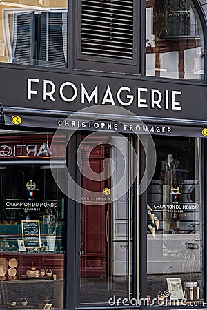 Bayonne, France 19.06.2020. Cheese shop on dark background. Flat design Editorial Stock Photo