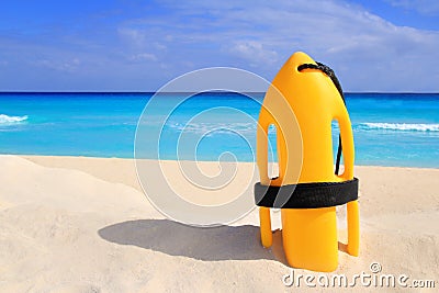 Baywatch rescue buoy yellow on tropical beach Stock Photo