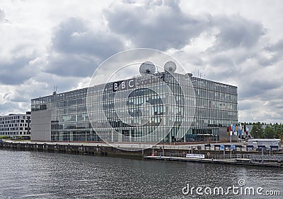 The BBC Scotland Building at Pacific Quay in Glasgow Scotland on a cloudy Summers day. Editorial Stock Photo