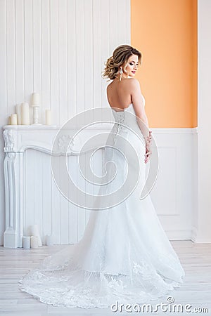 Bbeautiful bride wearing white gown Stock Photo