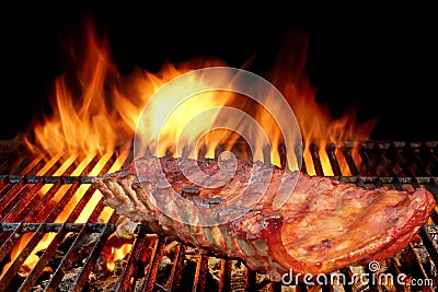 BBQ Baby Back Pork Ribs On The Hot Flaming Grill Stock Photo