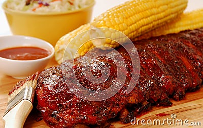 BBQ Ribs with cole slaw, corn and dipping sauce Stock Photo