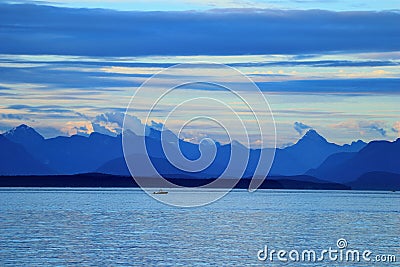 British Columbia Coast Mountains Panorama across Johnstone Strait in Evening Light, Campbell River, Vancouver Island Stock Photo