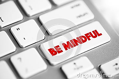 Be Mindful text button on keyboard, concept background Stock Photo