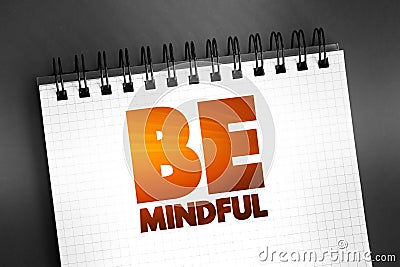 Be Mindful text on notepad, concept background Stock Photo