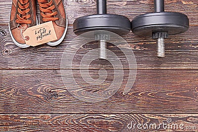 Be in physical form with dumbbells. Stock Photo