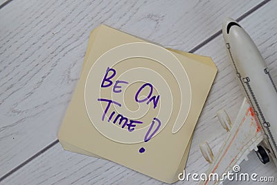 Be On Time write on sticky notes isolated on Wooden Table Stock Photo