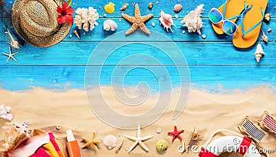 Beach Accessories On Blue Plank And Sand Stock Photo