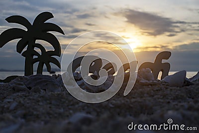 Beach with in the alphabet coconut and fishstar Stock Photo