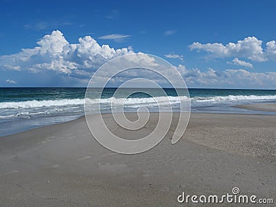 A beach with rolling clouds Stock Photo