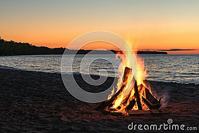 Beach Bonfire at Sunset Stock Photo