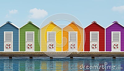 Beach cabins on wooden pier Stock Photo