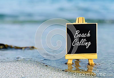Beach calling board on a beach. Stock Photo