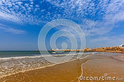 Beach and Cathedral in Cadiz, Andalusia, Spain Stock Photo