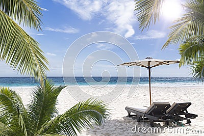 Beach chair at sunny coast. Seychelles. Stock Photo