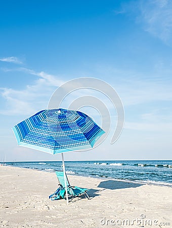 Beach Chair and Umbrella Stock Photo