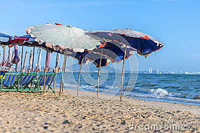Beach chair under the umbrella on the beach Stock Photo