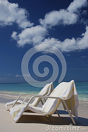 Beach chairs at Cayman Island Stock Photo