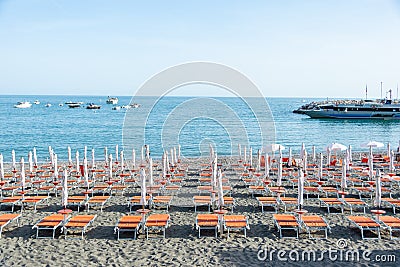 Beach Chairs and Umbrellas on The Maiori Beach, Amalfi Coast, Campania, Italy Stock Photo