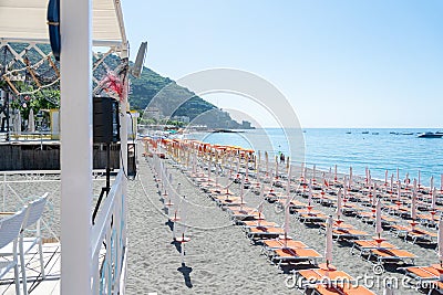 Beach Chairs and Umbrellas on The Maiori Beach, Amalfi Coast, Campania, Italy Editorial Stock Photo