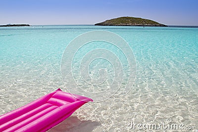 Beach floating lounge pink tropical sea Formentera Stock Photo