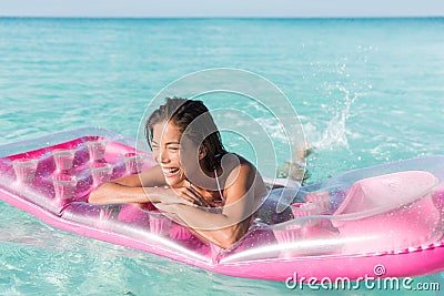 https://thumbs.dreamstime.com/x/beach-fun-girl-splashing-water-ocean-having-floating-pink-pool-float-toy-air-mattress-asian-woman-relaxing-sun-68706985.jpg