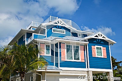 Beautiful New Blue and Coral Beach House Stock Photo