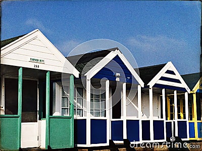 Beach huts along the seafront on a cold winter day Stock Photo