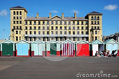 Beach huts and buildings on Brighton promenade Editorial Stock Photo