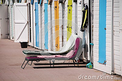 Beach huts in different colours in England. Stock Photo