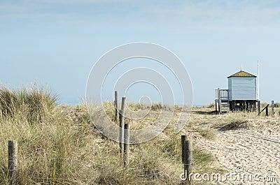 Beach huts on Mudeford sandbank Stock Photo