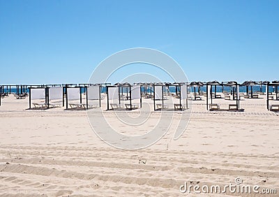 Beach Huts On Beach At Praia Do Barril Tavira Portugal Stock Photo