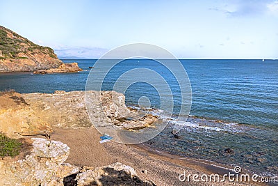 Beach and lake laghetto of terranera, a natural bay with black sand and free public beach near Porto Azzurro, Island of Elba, I Stock Photo