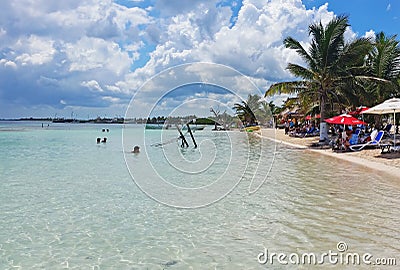 Beach with boats in Mahahual, Mexico Editorial Stock Photo