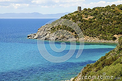 Beach Mare Pintau and Spanish Tower in Sardinia, Italy. Stock Photo