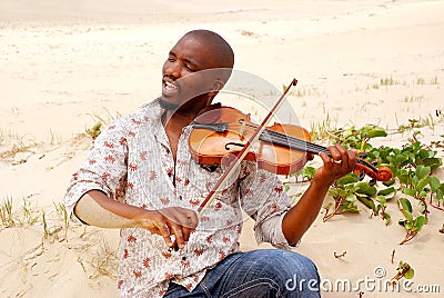 Beach musician portrait Stock Photo