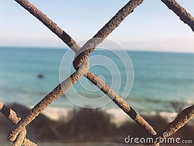 Beach Ocean Rusted Fence Stock Photo