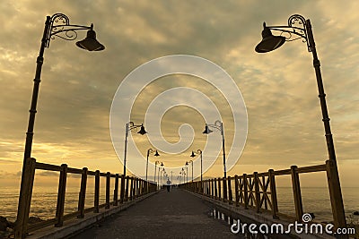 Beach pier and street light Stock Photo