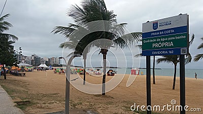 Beach Praia da Costa, beautiful sand, palm tress and sea, at Vila Velha, Espirito Santo, Brazil Editorial Stock Photo