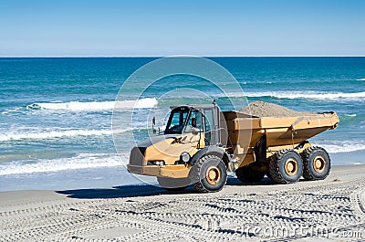 Beach Renourishment with Dump Truck Stock Photo