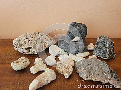 Beach Rock Collection with Coral Stock Photo