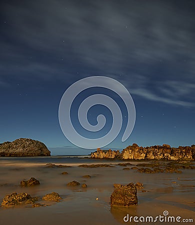 Beach with rocks in Playa de Ris, Noja, Spain Stock Photo