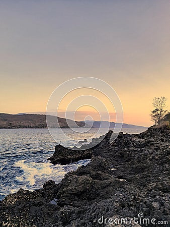 Beach, rocks and sunset, stunning beauty Stock Photo