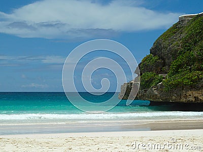 Beach with Rocky Overhang Stock Photo